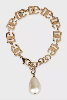 Gold bracelet with pendant