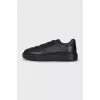 Men's black leather sneakers