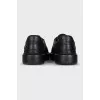 Men's black leather sneakers