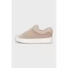 Suede sneakers with fur trim
