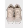 Suede sneakers with fur trim