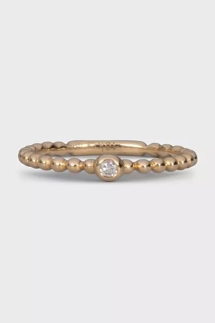 Gold ring with a diamond