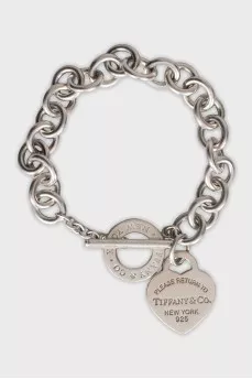 Silver bracelet with signature charm