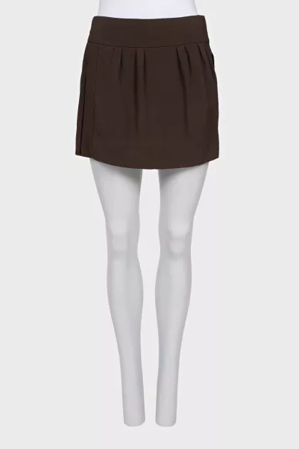 Straight mini skirt with a zipper and buttons