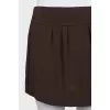 Straight mini skirt with a zipper and buttons