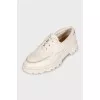 Leather lace-up shoes with logo