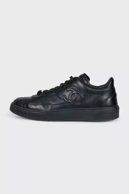 Black leather lace-up sneakers