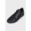 Black leather lace-up sneakers