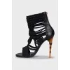Knitted sandals with a figured heel
