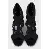 Knitted sandals with a figured heel
