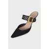 Black mules with a pointed toe