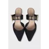 Black mules with a pointed toe