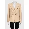 Fitted beige jacket with signature print