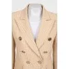 Fitted beige jacket with signature print