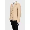 Fitted beige jacket with signature print