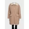 Beige parka with a wool hood