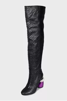 Snakeskin over-the-knee boots with an accent heel