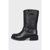 Black leather boots with straps
