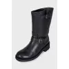 Black leather boots with straps