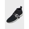 Sneakers decorated with a crystal buckle