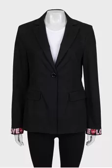 Black jacket with pink cuffs