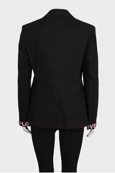 Black jacket with pink cuffs