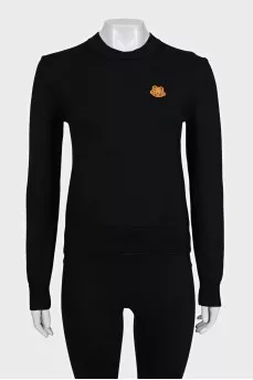 Wool jumper with branded patch
