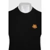 Wool jumper with branded patch