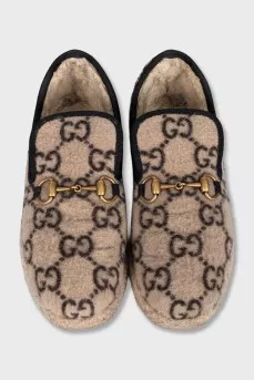 Insulated slip-ons with a signature monogram