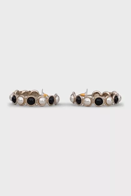Gold-color round earrings with crystals