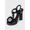 Heeled sandals decorated with beads