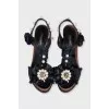 Heeled sandals decorated with beads