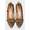 Green velvet shoes with a relief pattern