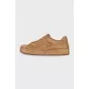 Brown lace-up sneakers