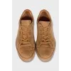 Brown lace-up sneakers