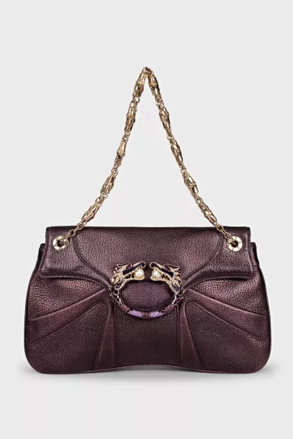 Purple bag with a gold clasp