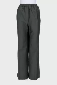 Green suit with straight trousers