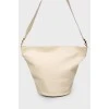 A bag with a round bottom on a belt