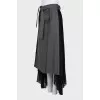 Button-down skirt with an asymmetrical hem