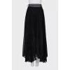Button-down skirt with an asymmetrical hem
