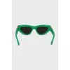 Green oval frame sunglasses