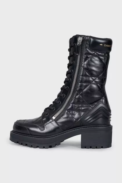 Black leather boots with tag