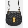 Bag with golden twist closure