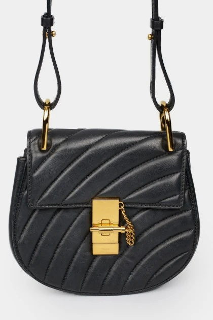 Bag with golden twist closure