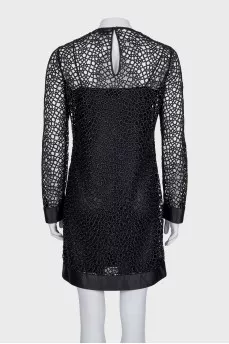 Black cocktail dress with long sleeves