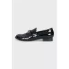 Black leather loafers with buckle