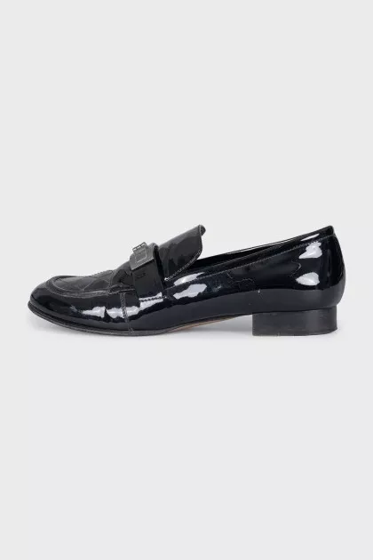 Black leather loafers with buckle