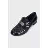 Black leather loafers with buckle