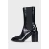 Black pointed-toe boots