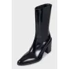 Black pointed-toe boots